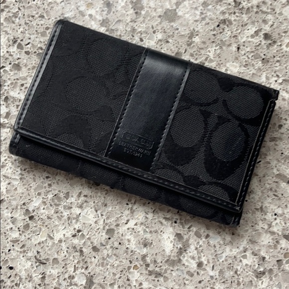 Coach Wallet/ it is split on some seems.